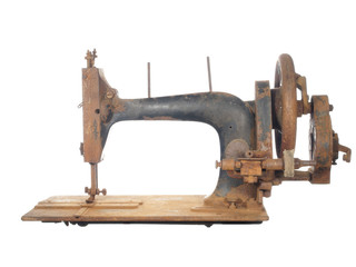 Rusty skeleton of an ancient sewing machine.