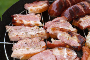 barbecue with delicious grilled meat on grill