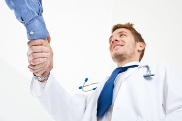 Friendly doctor greeting a new patient
