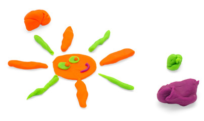 Sun made child from colorful molding dough  isolated on white