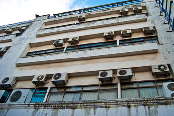 wall of the building with outer blocks of air-conditioners