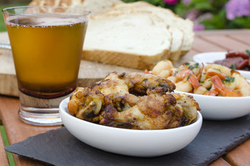 Tapas: pollo al ajillo, gambas pil pil & chorizo al vino.