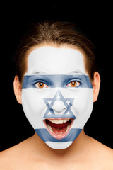 girl with israeli flag painted on her face