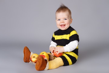 Little baby with apples