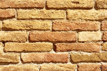 Old yellow and red brick wall