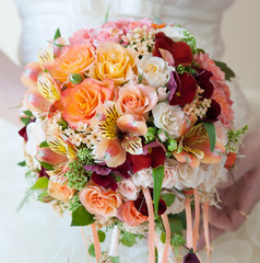 Bride with bouquet, closeup