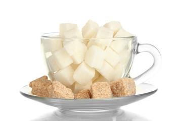 white refined sugar and Lump brown cane sugar cubes in glass