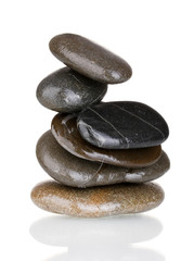 Stack of balanced stones isolated on white