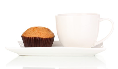 Fresh muffin with tea isolated on white