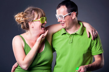 Fototapeta premium Happy young couple having fun - studio shot