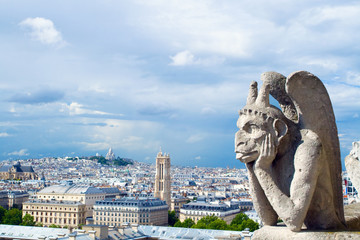 Gargoyle of Notre Dame looks to Paris