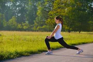 woman stretching before fitness