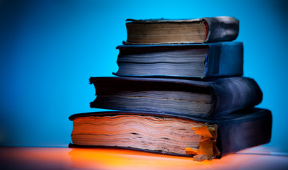 Old books, blue light  background