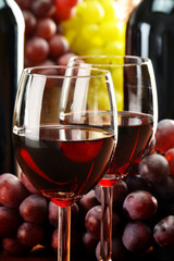 Composition with two glasses and bottles of wine