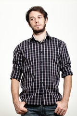 Fototapeta premium Serious Man with Freckles and Checkered Shirt