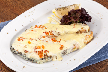 grilled salmon with white caviar sauce