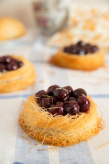 Baked pastry with cherries