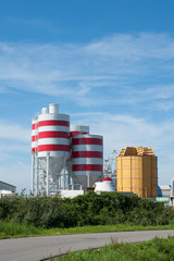 storage tanks with red stripes