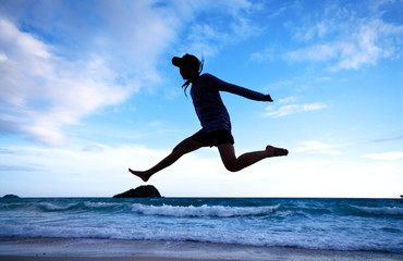 jumping at the beach