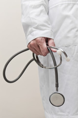 Hand holding stethoscope