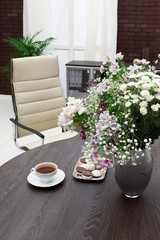 bouquet of flowers on a desk