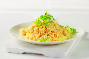 Couscous with salad greens