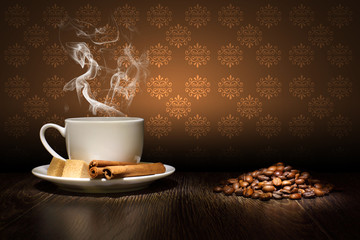 Coffee beans and white cup