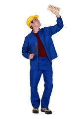 Full-length shot of a bricklayer