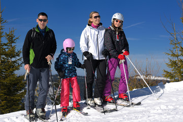 portrait of happy young family at winter