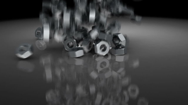 3d video of many metallic nuts falling down
