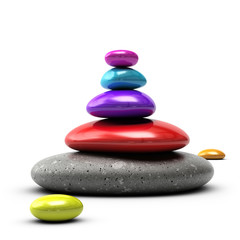 colorful pebbles stacked over white background