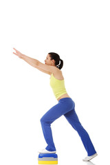 Fitness girl is working out with stepper