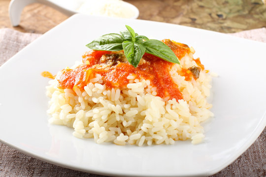 Rice with tomato sauce and basil