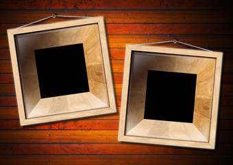 Two Wooden Frame on a Old Wood Wall