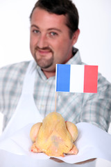 Man with French poultry
