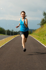 Fototapeta na wymiar Girl running, jumping outdoor