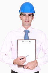 Site surveyor holding clip-board