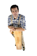 Worried builder with planks of wood