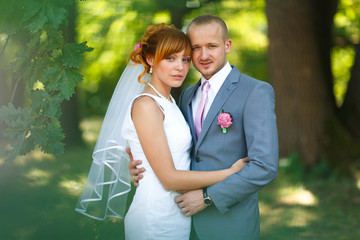 groom and bride posing on their wedding day