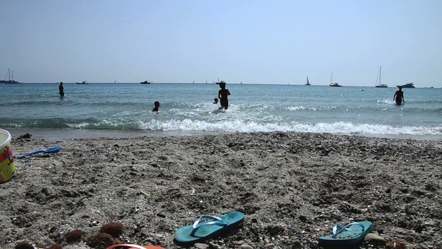 Kids running on beach