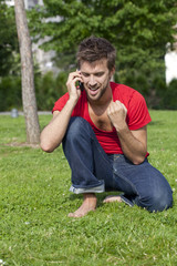 convincing young man talking on the phone