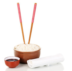 Bowl of rice and chopsticks isoalted on white