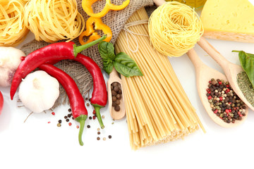 Pasta spaghetti, vegetables and spices, isolated on white