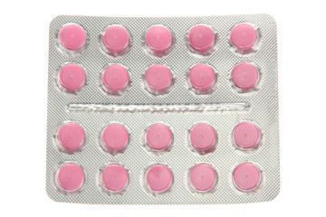 pills packed in blisters, isolated on white