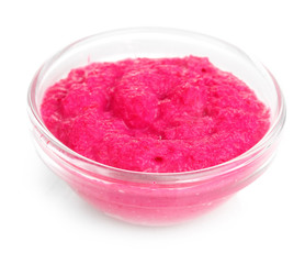 Horseradish red sauce in glass bowl isolated on white