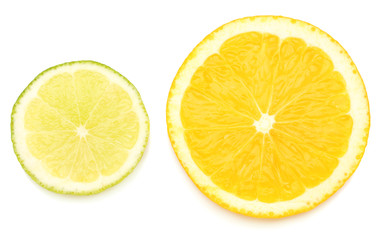 Slices of lime and orange isolated on white
