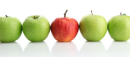 Ripe green apples and one red apple isolated on white