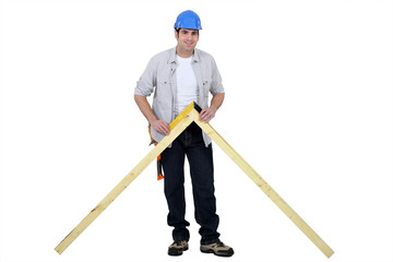 Obraz premium carpenter making a wooden frame