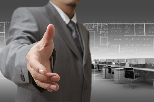 man extending hand to shake