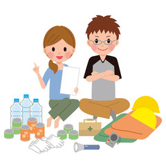 防災グッズを用意する男女